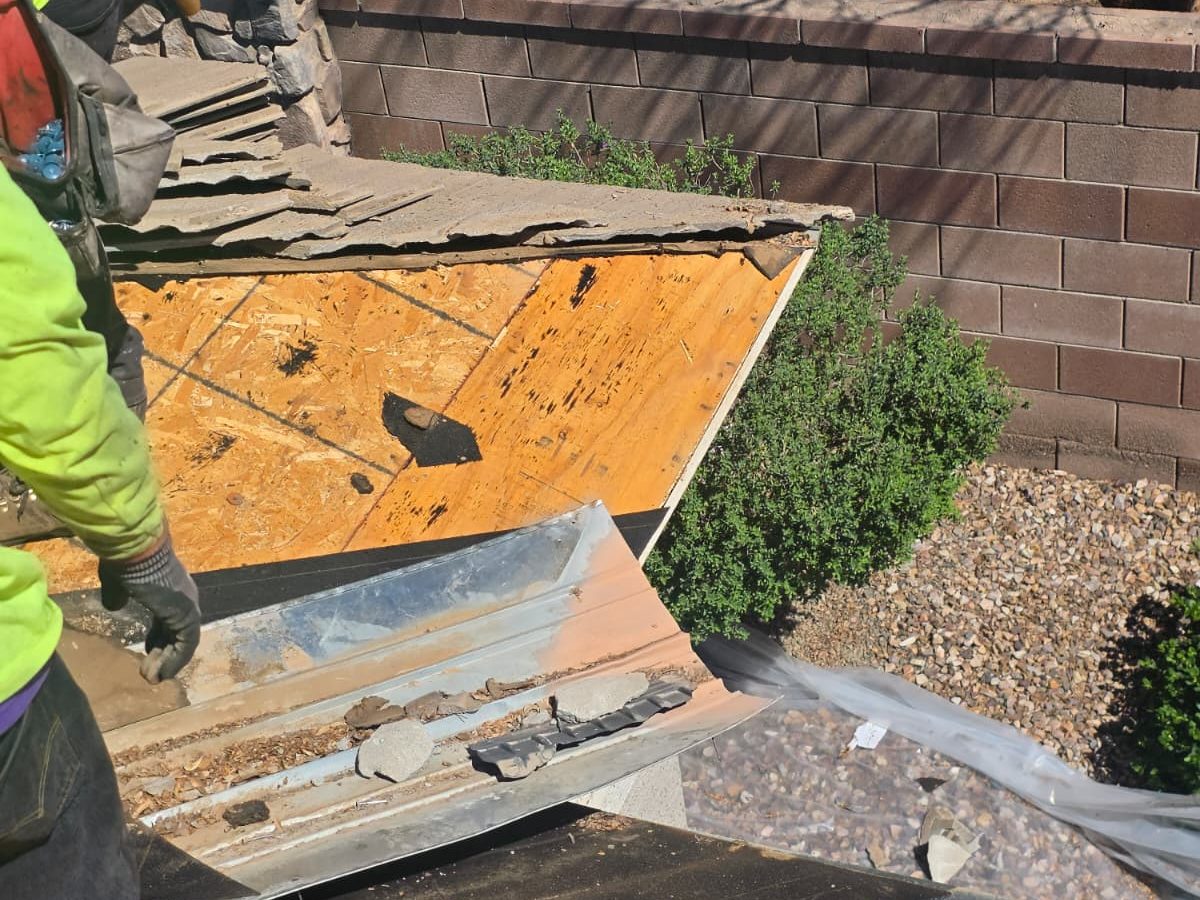 Open roof deck repair area before tile replacement