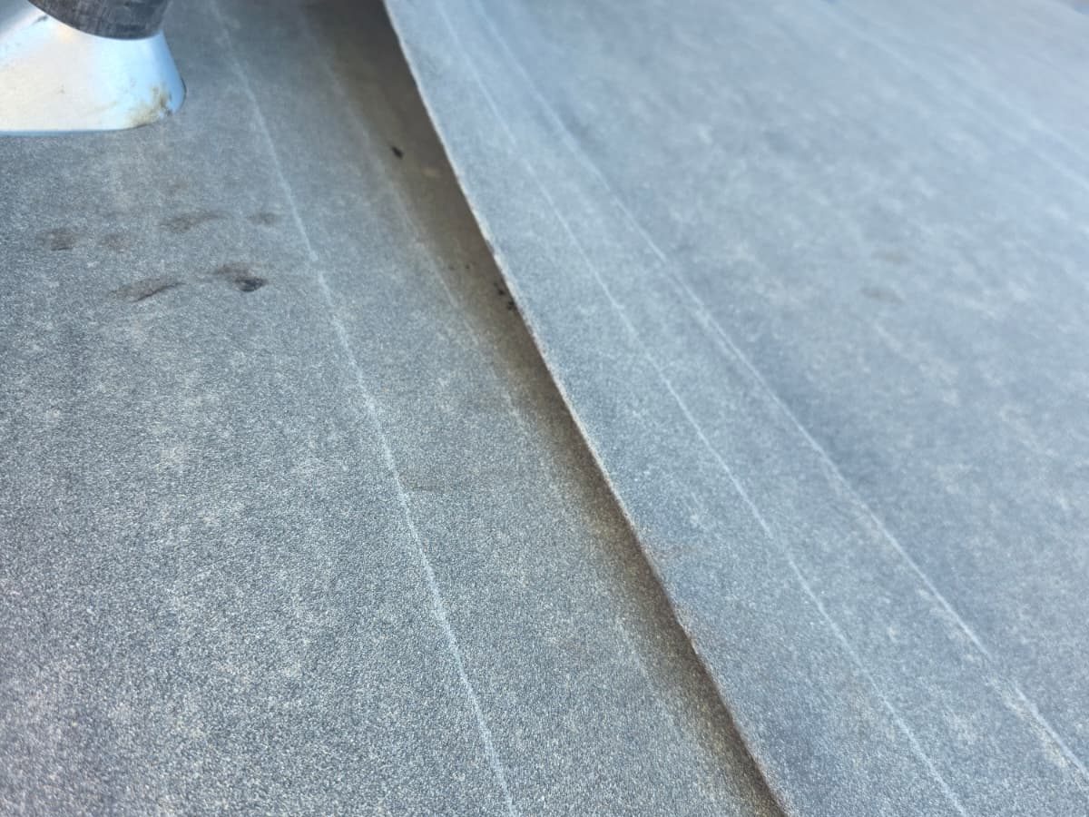 Pipe flashing detail on a tile roof